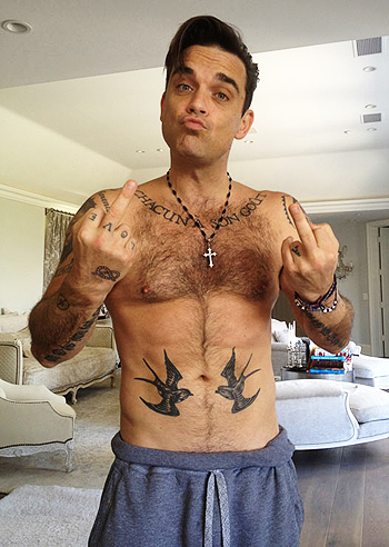 robbie williams fisico